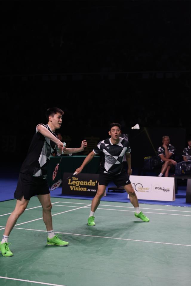 包含日本羽毛球队险胜中国羽毛球队，陶菲克关键制胜的词条